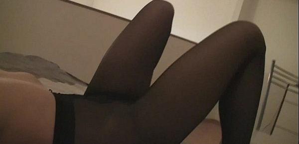  Busty teen teases while wearing pantyhose